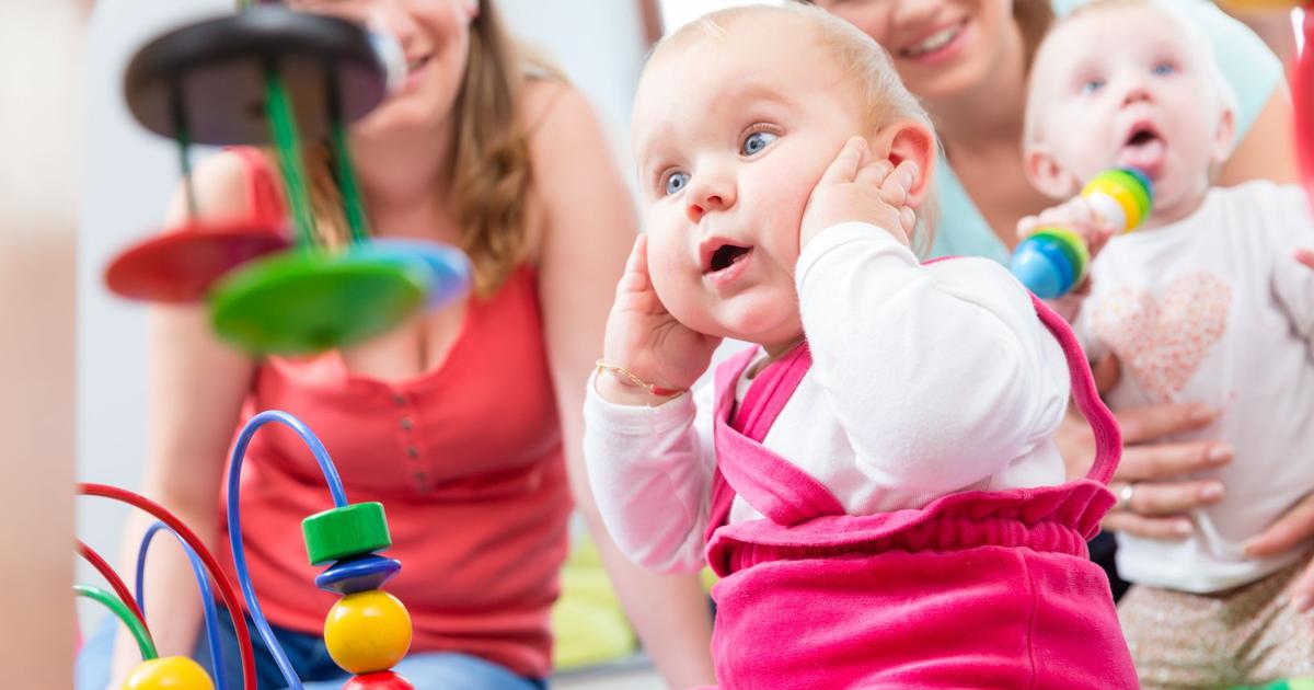 Cute baby girl showing progress and curiosity